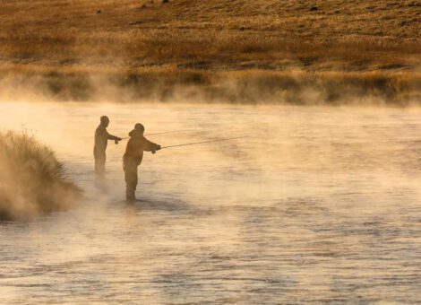 two men fall fishing on the madison river in yellowstone national park